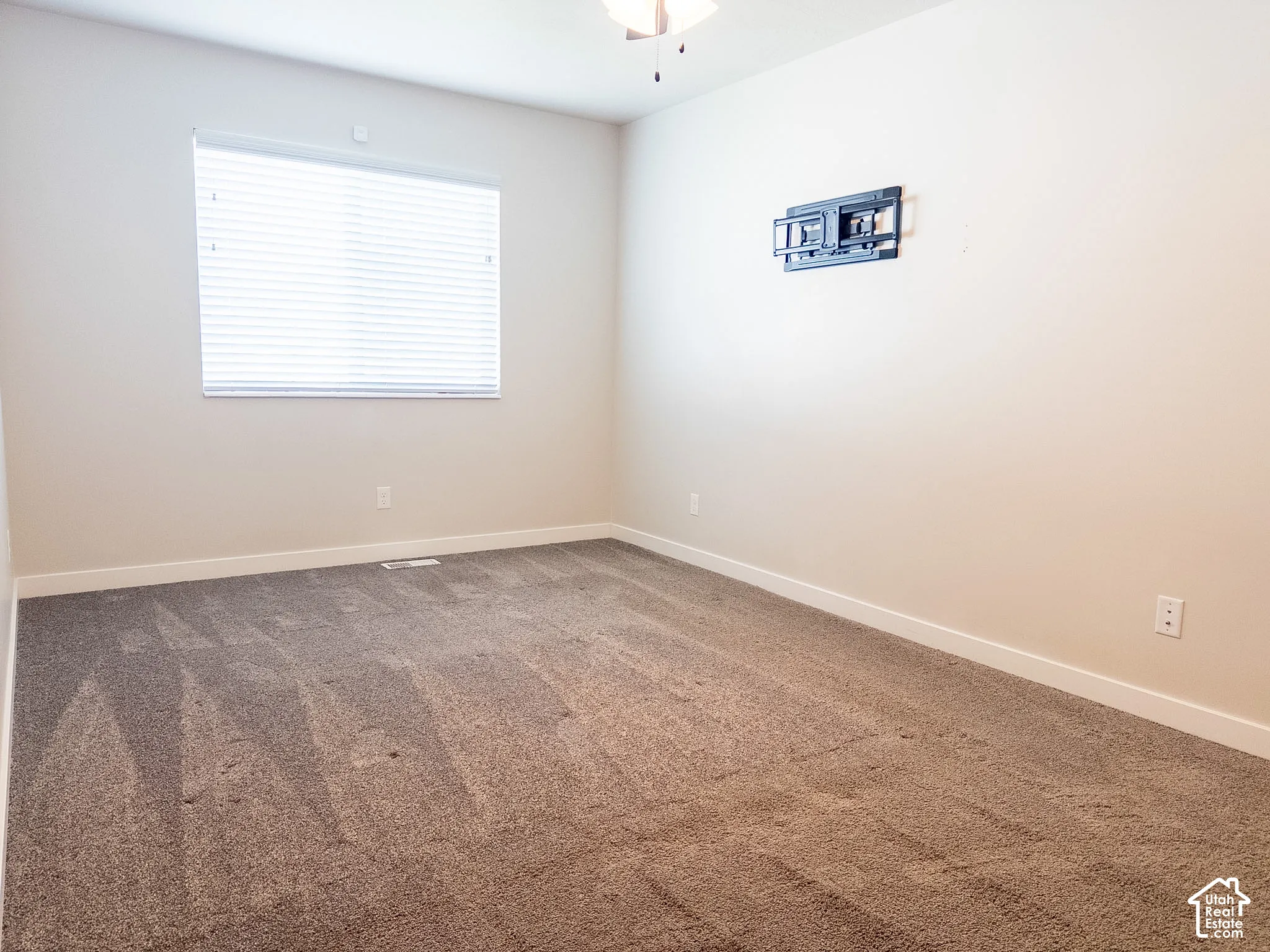Primary bedroom with attached bathroom