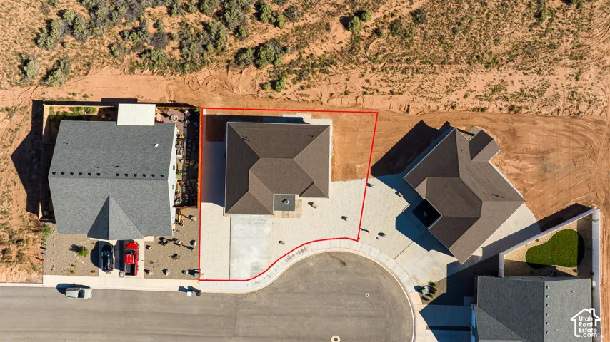 Property with a cul-de-sac location, paved driveway, and established neighboring residences