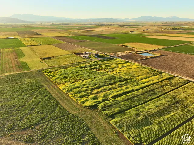 Aerial perspective looking North West of expansive agricultural acreage.