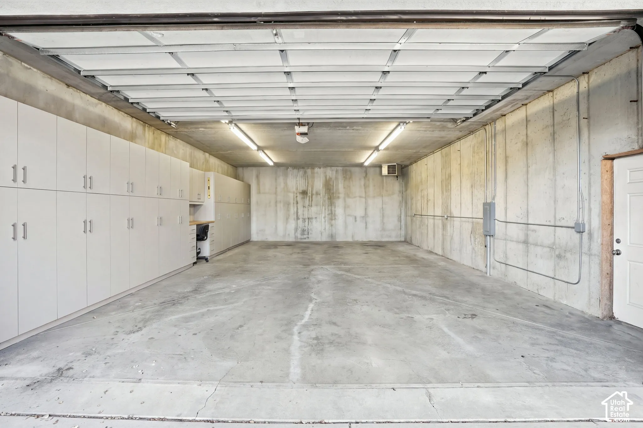 Detached garage lower level, 4 car tandem, heated