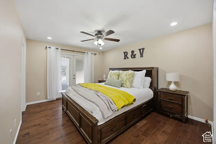 Room featuring wood-finish flooring, recessed lighting, a ceiling fan, and double-panel glass doors