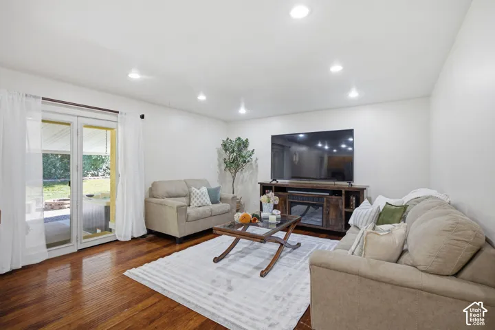 Room featuring wood-finish flooring, recessed lighting, and full-light French doors