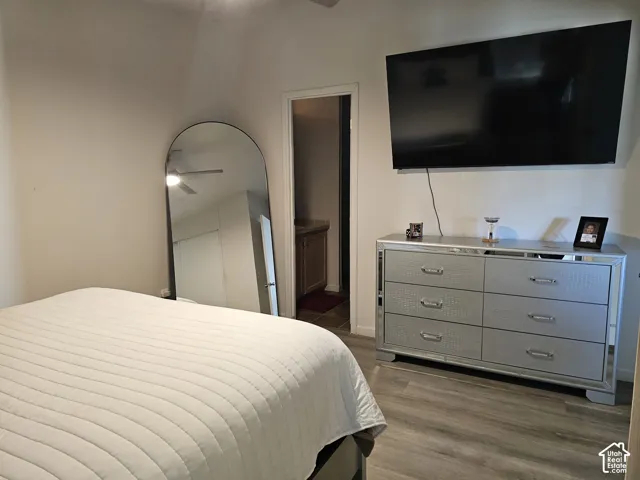 Wood-finish flooring and ceiling-mounted light fixture