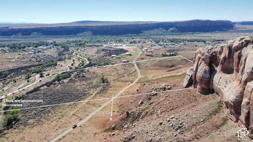 Aerial parcel featuring desert terrain, rock formations, and arid vegetation
