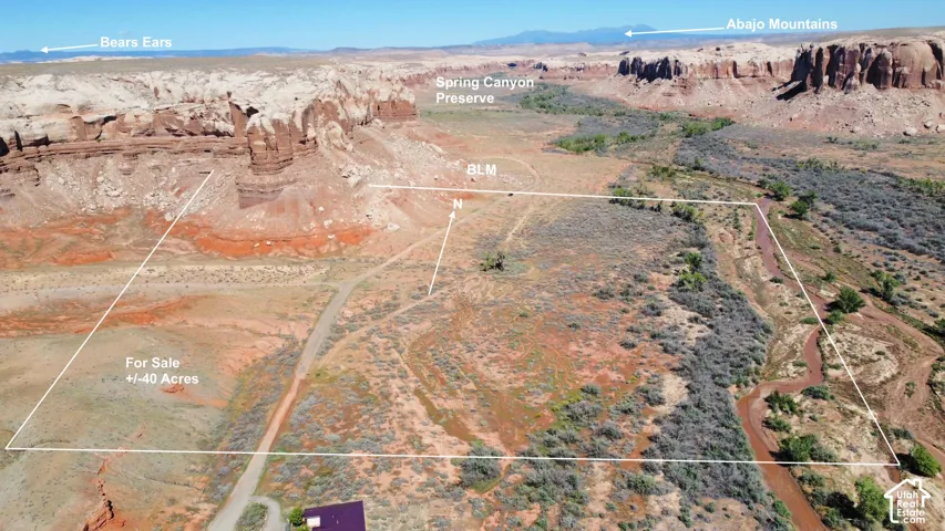 Approximately 40 acres of high-desert terrain featuring natural rock formations and native vegetation, highlighted by panoramic mountain and canyon scenery
