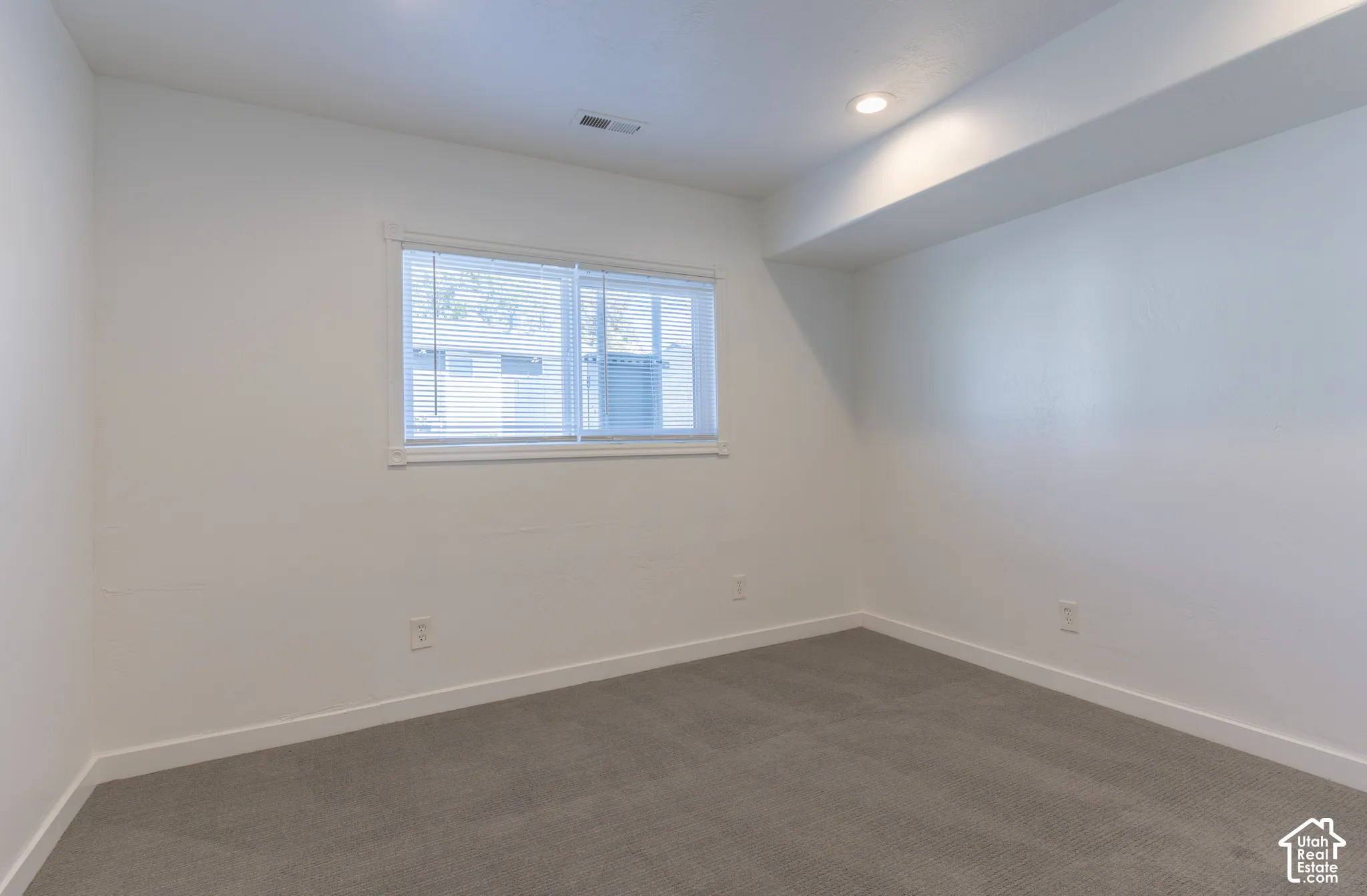 Bedroom #1 on main floor with new carpet