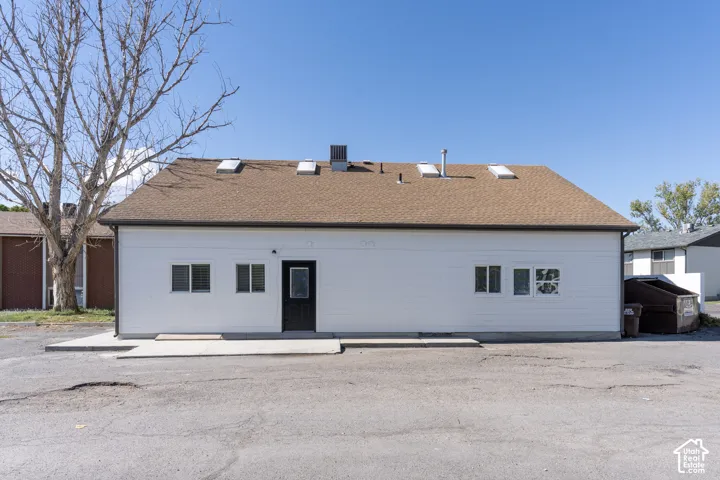 Exterior back of home with separate ADU entrance