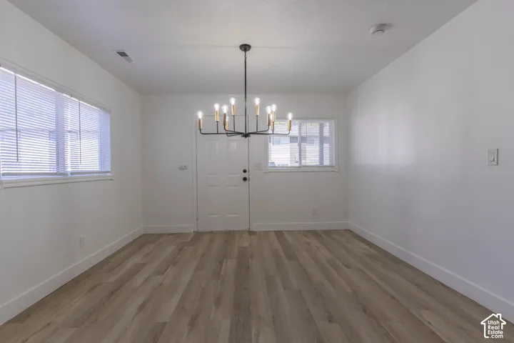 Dining room with new flooring and lighting
