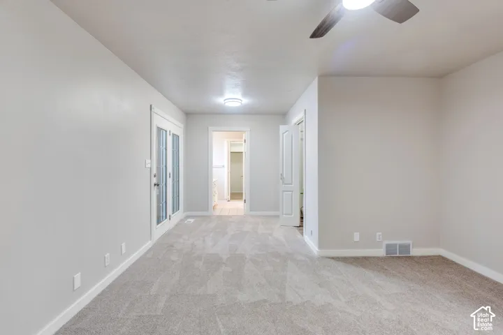 Primary bedroom with walk in closet and en suite bath