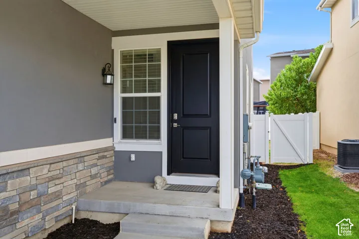 Covered front porch with concrete steps