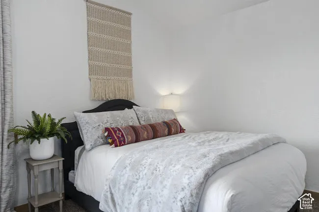 Built-in wall sconce lighting complements the neutral wall color