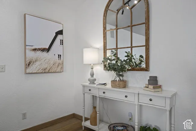 Wood-finish flooring with white wall finishes