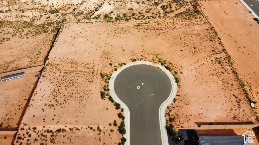 Expansive vacant lot situated on a paved cul-de-sac