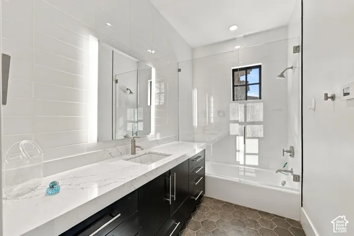 Third multi-level bedroom in west wing of home. Each room features living space, bathroom and walk-in closet on main level with bedroom and terrace access upstairs.