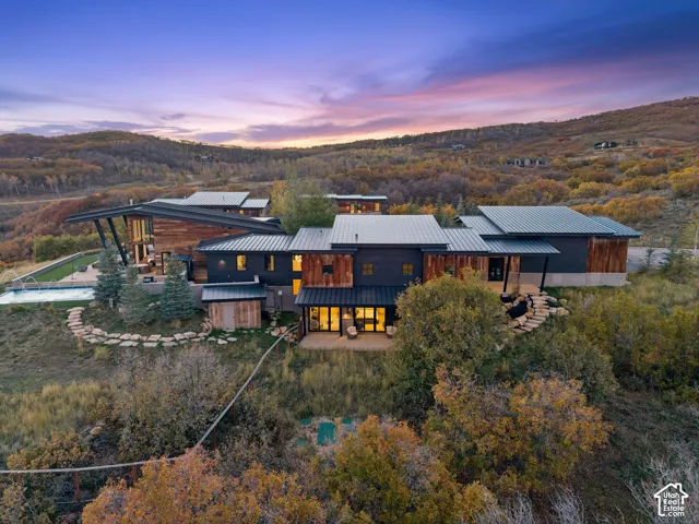 Custom private mountain estate set on 10.88 acres in The Preserve in Park City. Features a sprawling architectural design, expansive gated entry and direct view of the Wasatch Back, Park City, Deer Valley and the Uinta Range.