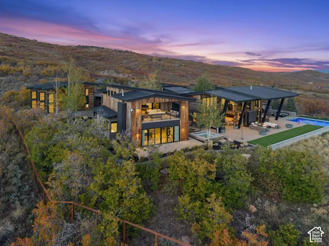 Presenting the private Mountain Bluebird Estate. Situated on 10.88 acres near the top of The Preserve in Park City. This contemporary architectural masterpiece is the perfect mountain retreat.