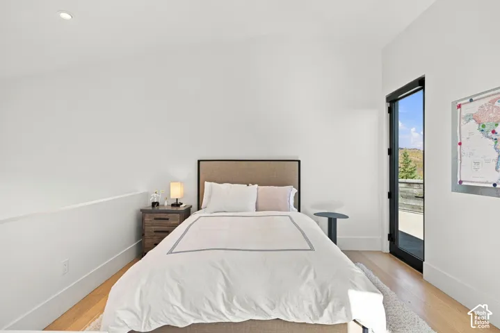 First multi-level bedroom in west wing of home. Each room features living space, bathroom and walk-in closet on main level with bedroom and terrace access upstairs.
