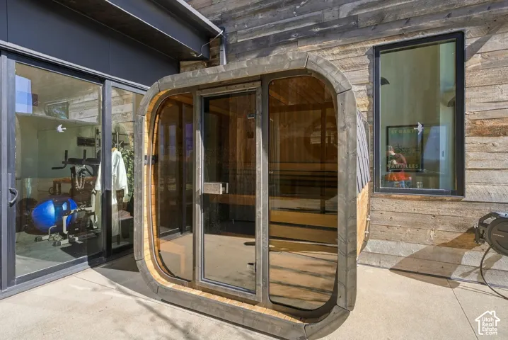 Brand new standalone outdoor sauna featuring a cedar interior is just steps from the gym and the primary suite.