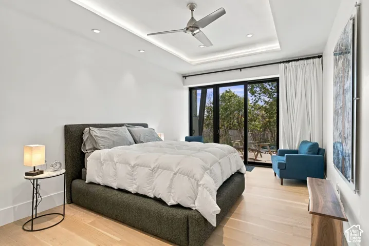 Second quest quarters bedroom offers patio access to enjoy the sunrise.