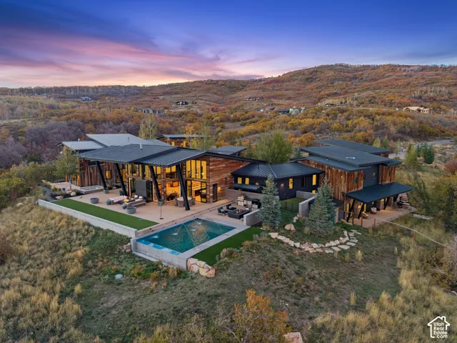 Presenting the private Mountain Bluebird Estate. Situated on 10.88 acres near the top of The Preserve in Park City. This contemporary architectural masterpiece is the perfect mountain retreat.