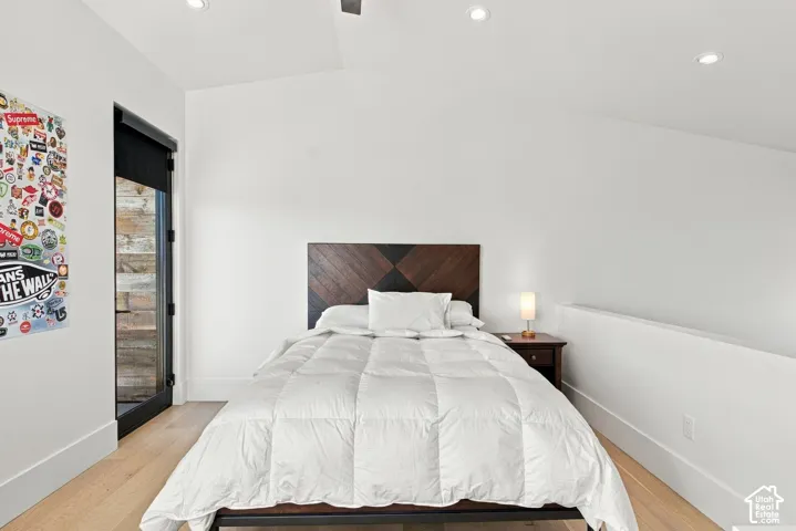 Second multi-level bedroom in west wing of home. Each room features living space, bathroom and walk-in closet on main level with bedroom and terrace access upstairs.
