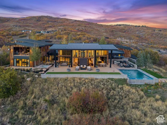 Presenting the private Mountain Bluebird Estate. Situated on 10.88 acres near the top of The Preserve in Park City. This contemporary architectural masterpiece is the perfect mountain retreat.