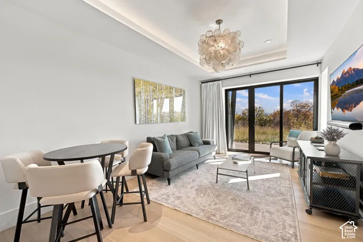 Guest quarters living room offers patio access to enjoy the sunrise.