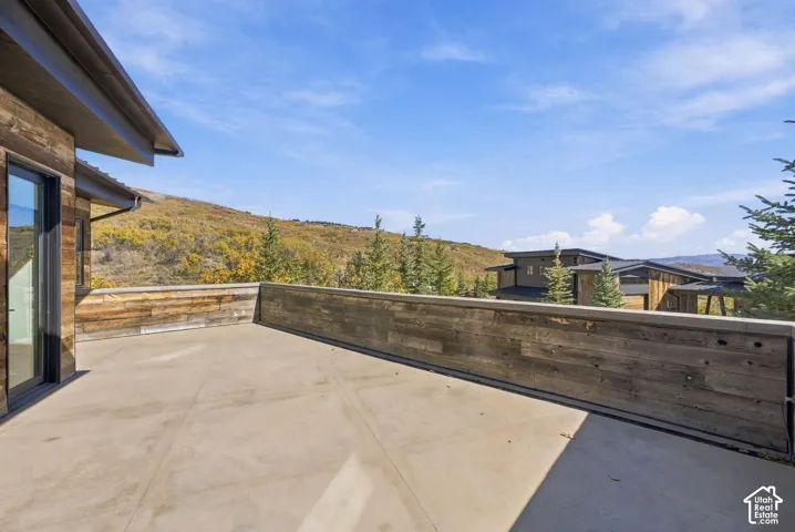 Elevated terrace is accessed from each of the three west wing bedrooms and provides180 degree views
