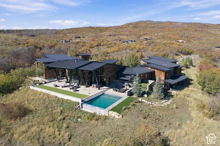 Presenting the private Mountain Bluebird Estate. Situated on 10.88 acres near the top of The Preserve in Park City. This contemporary architectural masterpiece is the perfect mountain retreat.