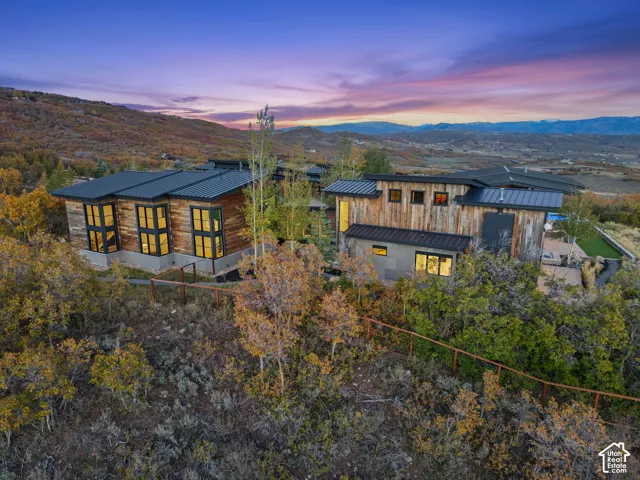 Custom private mountain estate set on 10.88 acres in The Preserve in Park City. Features a sprawling architectural design, expansive gated entry and direct view of the Wasatch Back, Park City, Deer Valley and the Uinta Range.