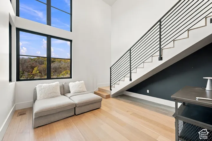 Second multi-level bedroom in west wing of home. Each room features living space, bathroom and walk-in closet on main level with bedroom and terrace access upstairs.