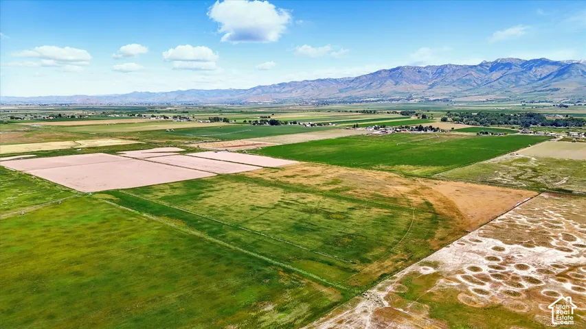 Expansive acreage featuring open fields and mountainous scenery