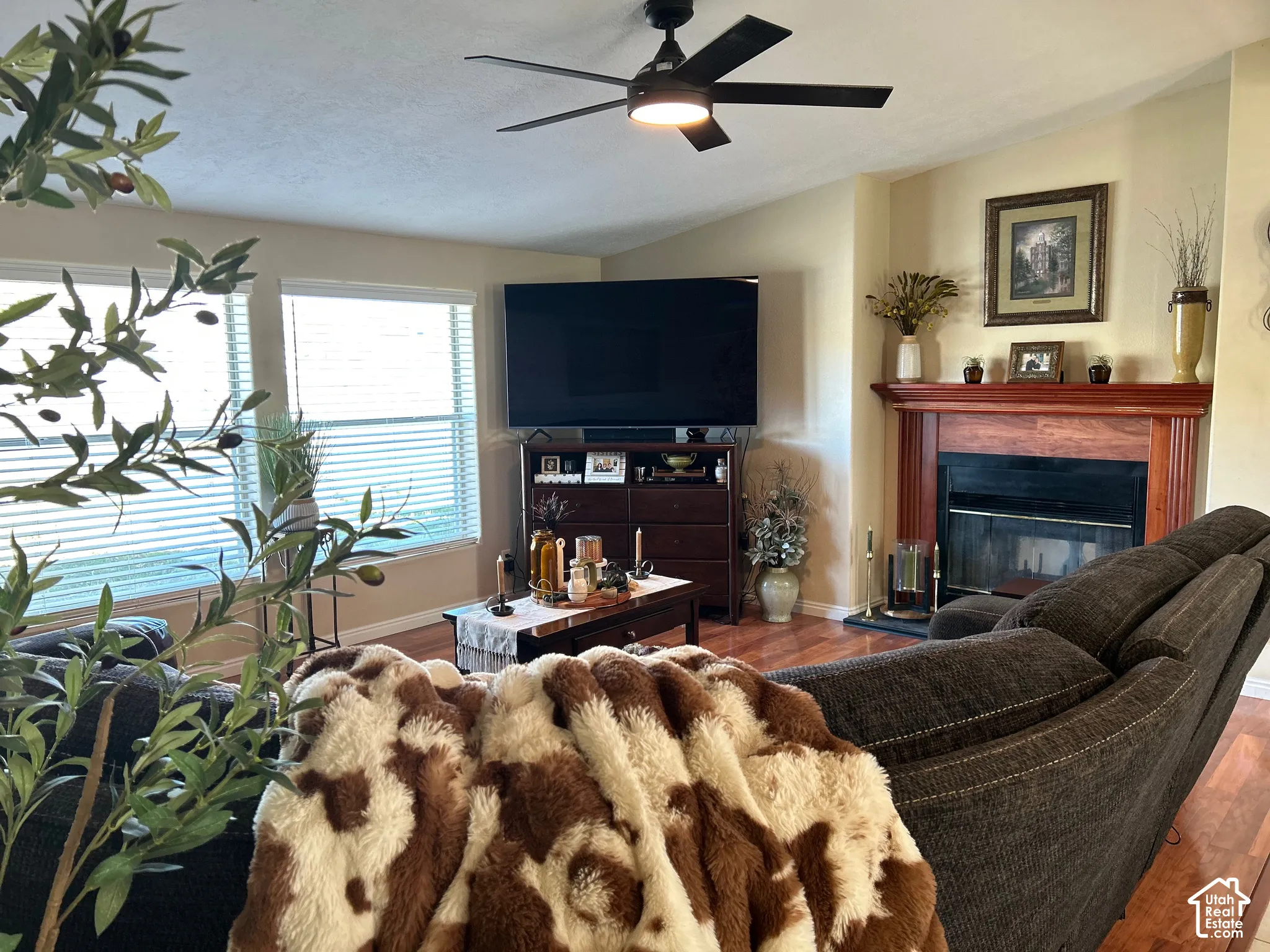 Cozy family room just off kitchen area with fireplace