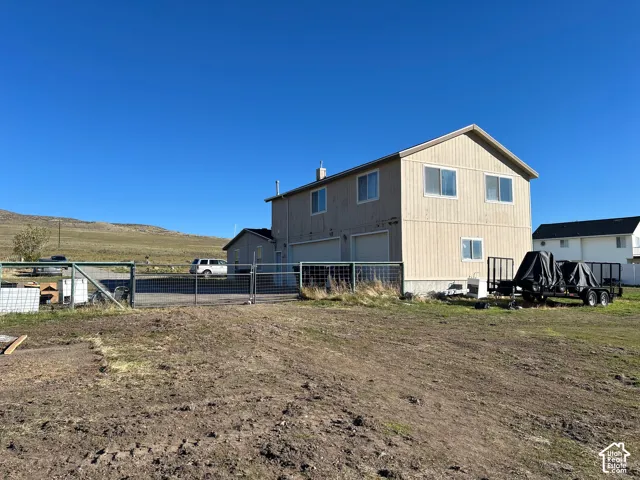 Back of home three car garage