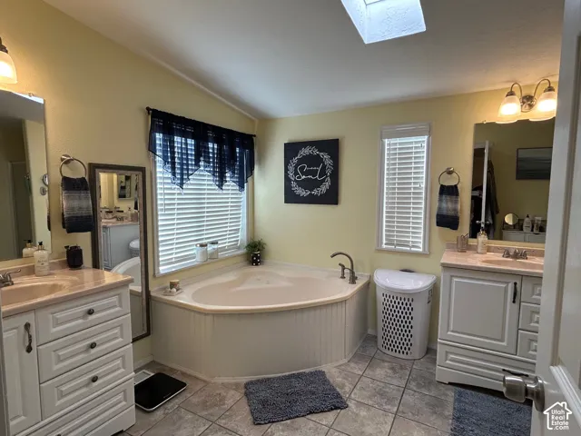 Primary bedroom bath, separate shower with soaker tub
