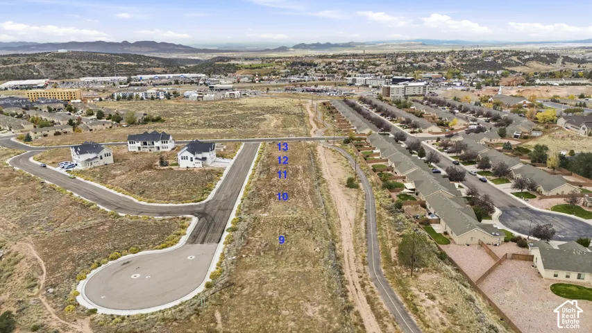 Vacant residential lots featuring paved street access, utility hookup readiness, and expansive mountain scenery