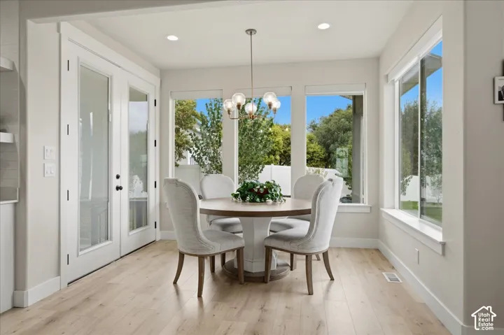 Substantial, light filled dining area leads to back patio