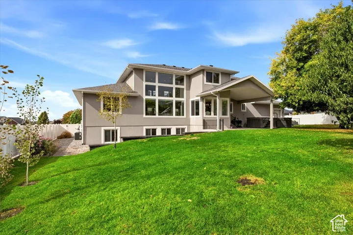 Approximately $100,000 invested in completed landscaping! 0.41 acre lot, located in a premier Pleasant View neighborhood