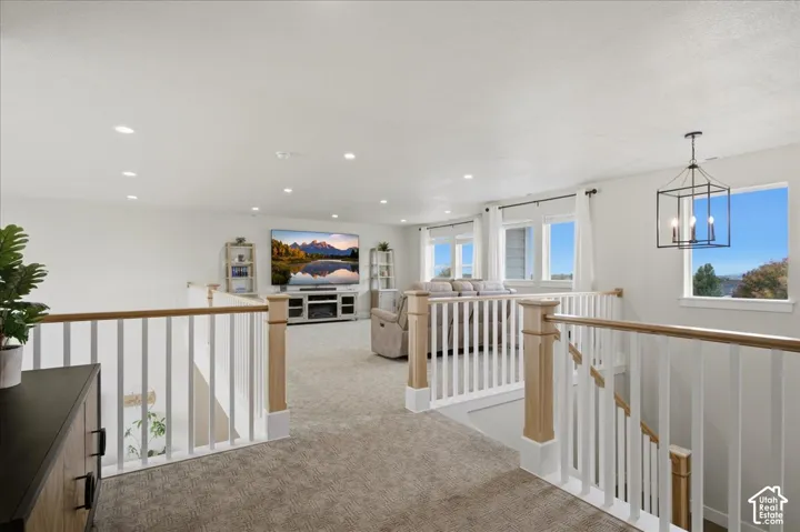 Spacious loft family room gives multiple options for entertaining and relaxing