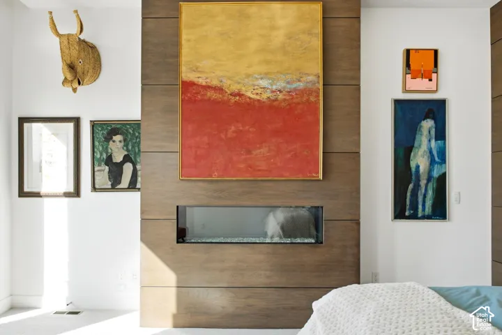 Floor-to-ceiling wood-paneled wall feature with a built-in horizontal linear fireplace