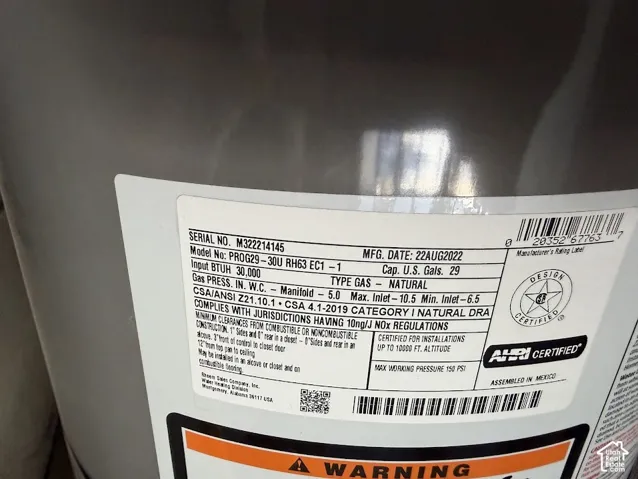 Natural gas water heater featuring a 29-gallon capacity and a 2022 manufacturing date