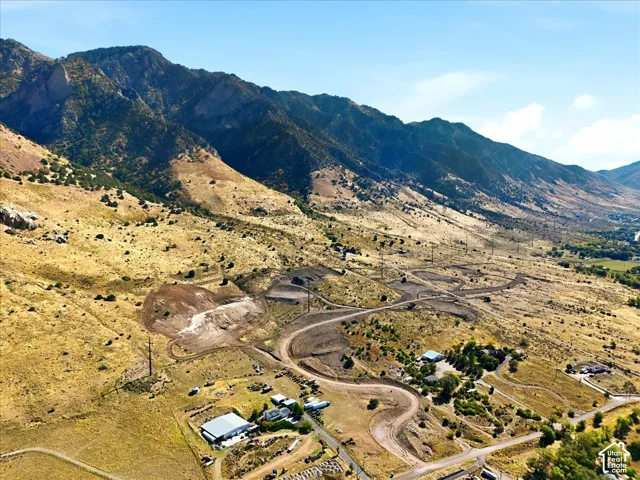 Expansive parcel featuring rugged mountain topography, elevated terrain, and dirt access roads