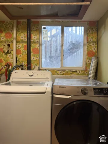 Horizontal sliding window with white frame and dedicated dryer venting
