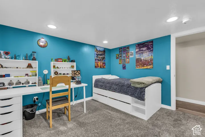 Interior room featuring wall-to-wall carpeting and recessed lighting