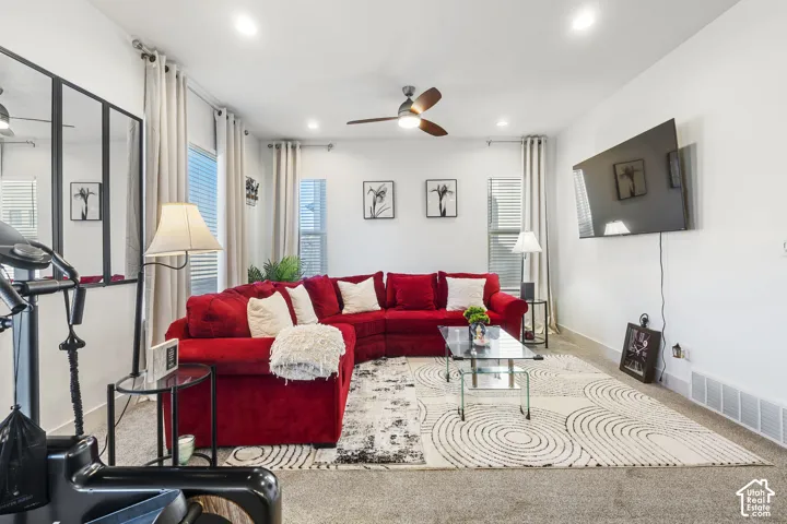 Recessed ceiling lighting, multi-panel wall mirror, and ceiling fan with integrated lighting