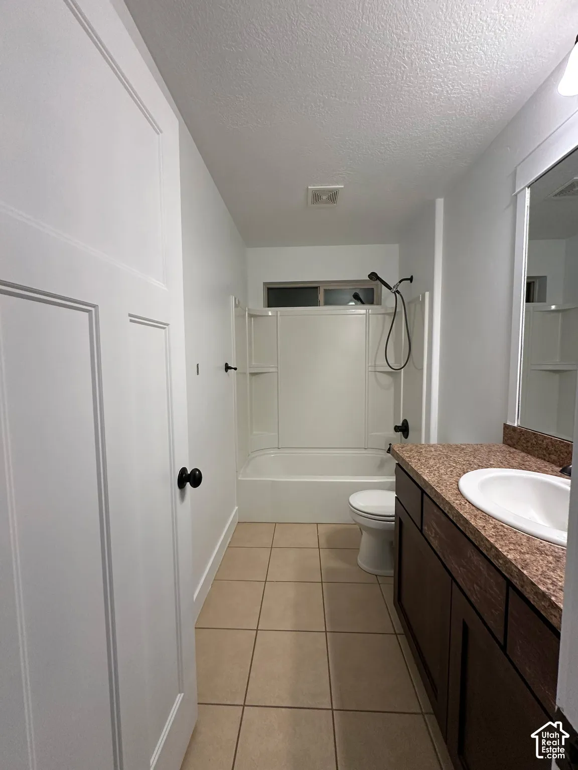 Upstairs full bath. Another full bath is on the basement level.