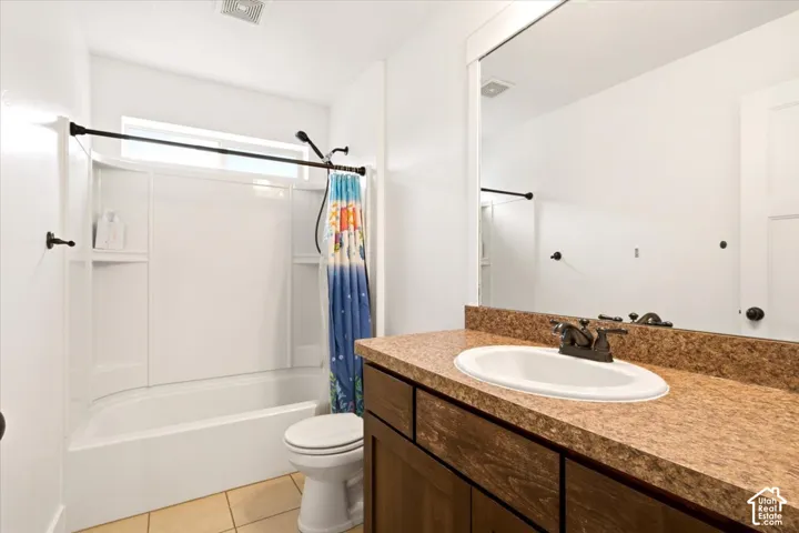 Full bath downstairs by the living room and 2 bedrooms.