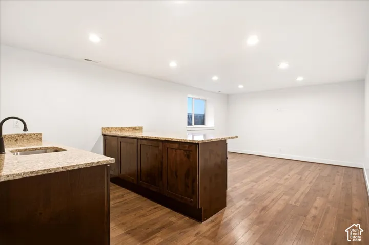 Basement kitchenette - does not have a stove. Fridge is undercounter size.