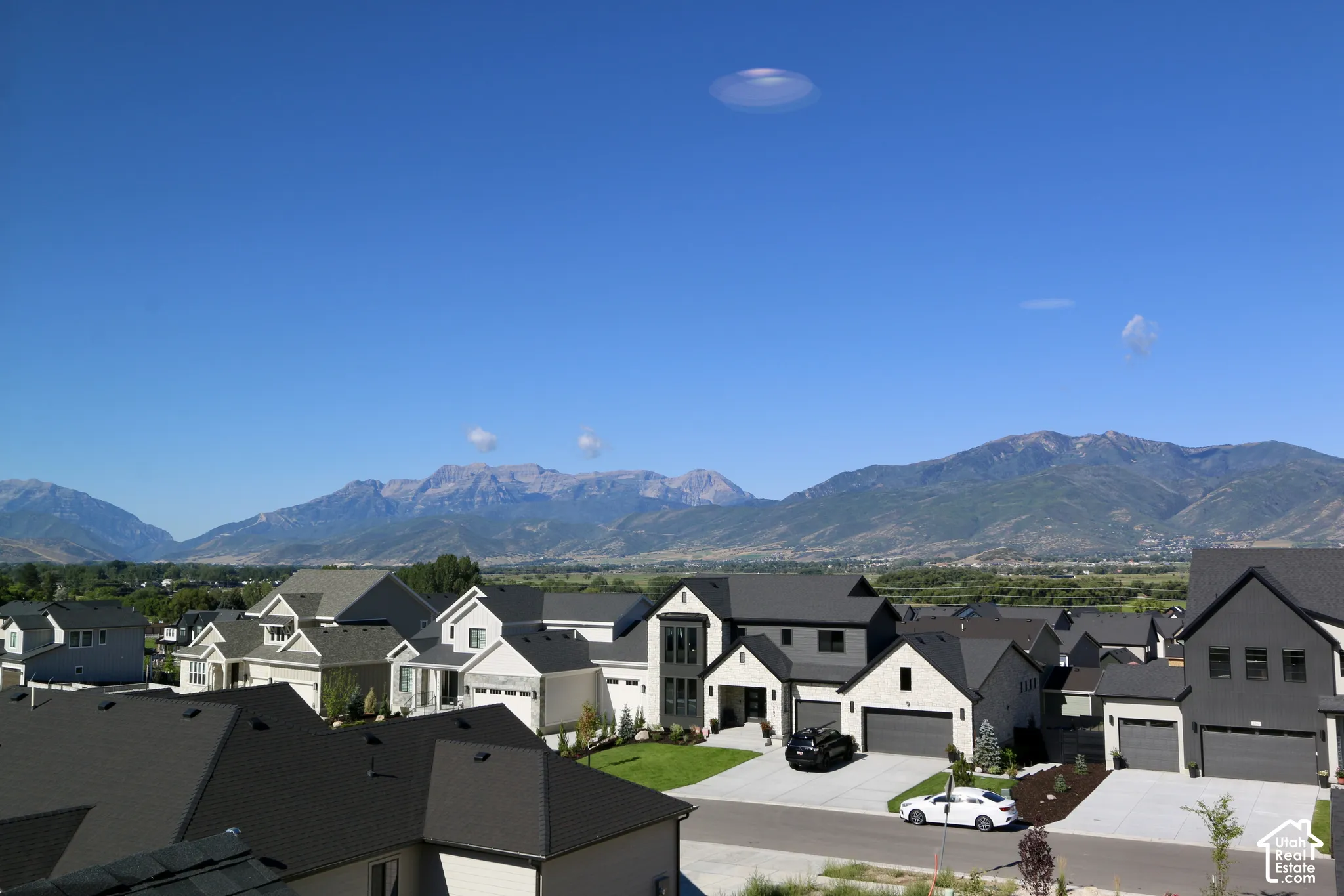 View from loft showcasing prominent mountain range backdrops