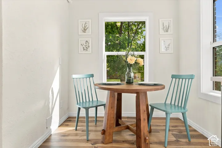 Neutral-toned walls featuring wood-finish flooring and dual double-hung windows
